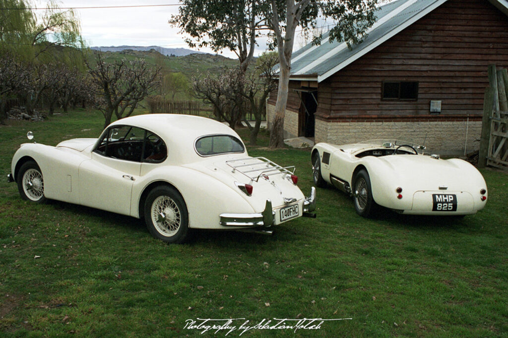 Jaguar C-Type and XK140 FHC in Alexandra New Zealand Photo by Sebastian Motsch