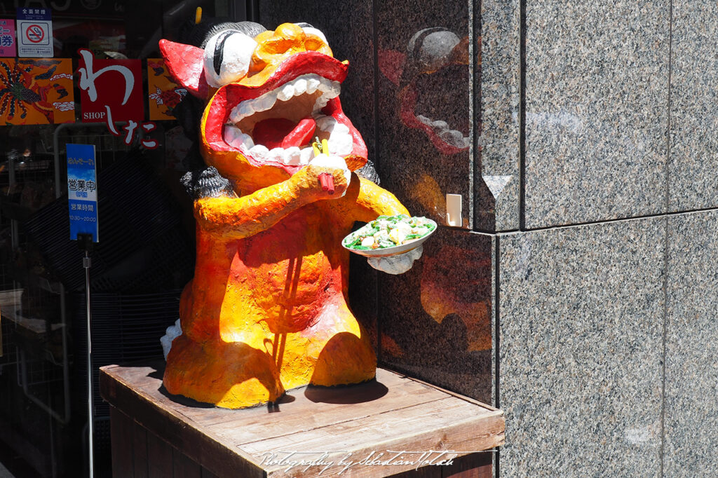 Restaurant with Statue in Ginza Tokyo Japan by Sebastian Motsch