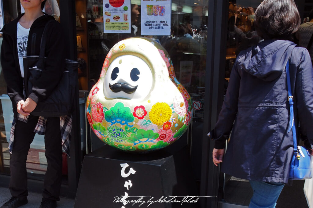 Shop with Statue in Ginza Tokyo Japan by Sebastian Motsch