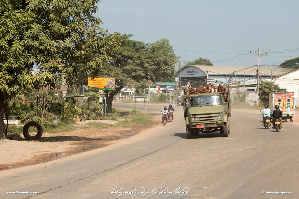 Chinese Truck with Wood Carvings Street Scene Laos Vientiane Drive-by Snapshots by Sebastian Motsch