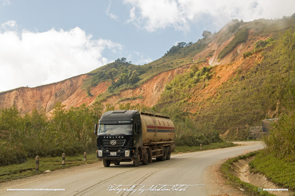 Genlyon Tanker Truck on Road 13 Erosion visible in Background Laos Drive-by Snapshot by Sebastian Motsch