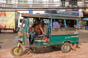 Green Tuk-Tuk in Laos Vientiane Drive-by Snapshot by Sebastian Motsch