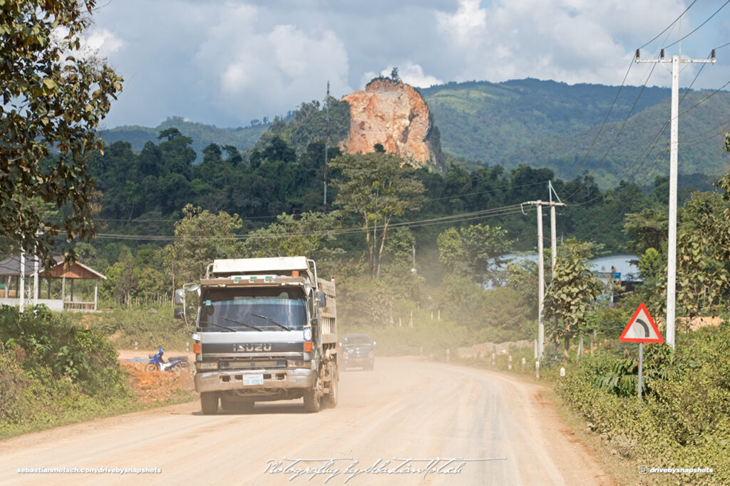 Isuzu Truck on Road 13 Laos Drive-by Snapshot by Sebastian Motsch