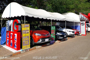 MG Cars and SUV Display in Laos Vientiane Drive-by Snapshot by Sebastian Motsch