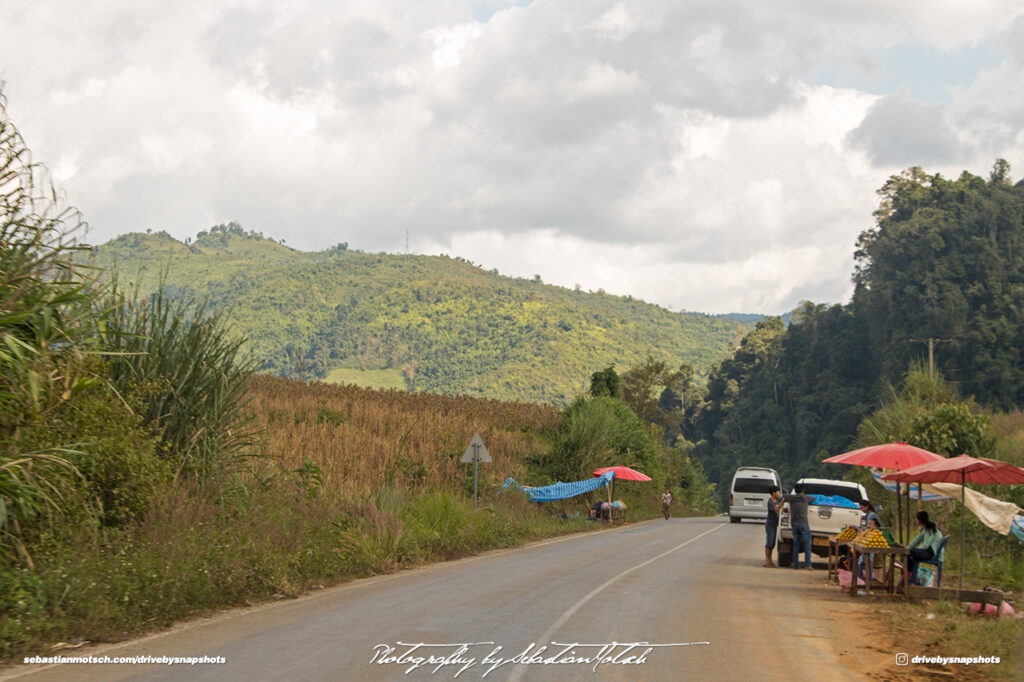 Roadside Food Stall on Road 13 Laos Drive-by Snapshot by Sebastian Motsch