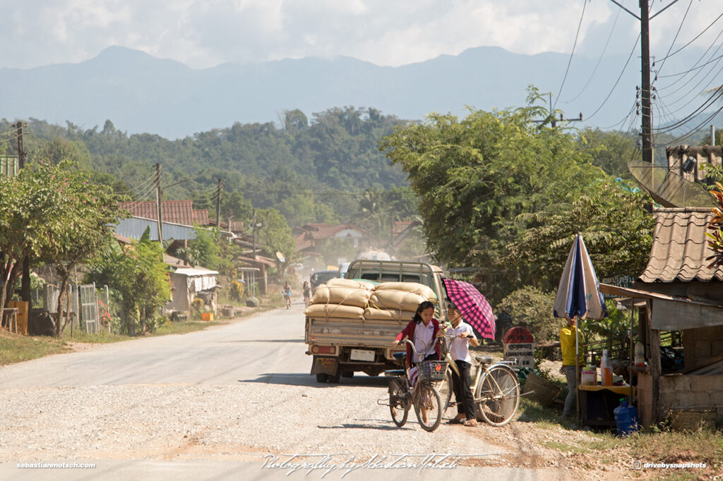 Town in Laos on Mountain Road 13 Drive-by Snapshots by Sebastian Motsch