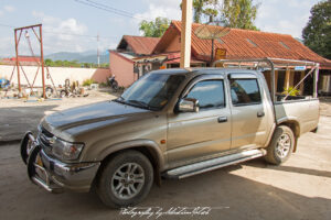 Toyota Hilux 4x2 Crew-Cab Luang Prabang Laos Drive-by Snapshot by Sebastian Motsch