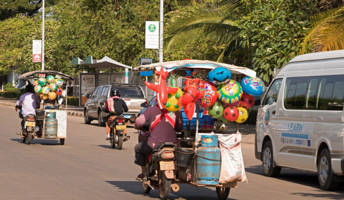 Tuk-Tuks in Laos Vientiane Drive-by Snapshot by Sebastian Motsch