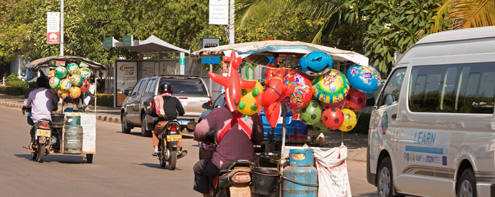 Tuk-Tuks in Laos Vientiane Drive-by Snapshot by Sebastian Motsch