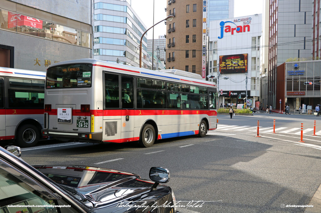 Japan Tokyo Gotanda JDM Taxi and TOC Express Bus by Sebastian Motsch