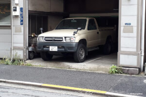 Japan Tokyo Shiba Toyota Hilux 4x4 and Vespa by Sebastian Motsch