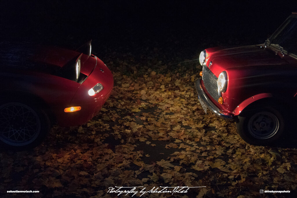 Mazda Miata NA and Austin Mini Fall Leaves by Sebastian Motsch