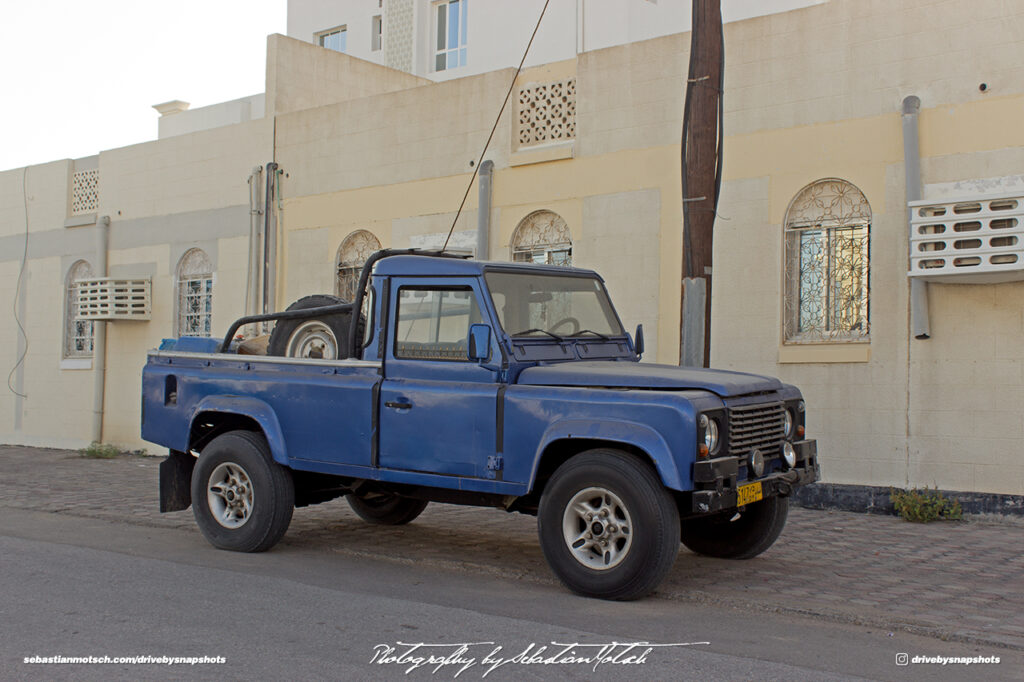 Land Rover Defender LWB Pick-up Oman Muscat Drive-by Snapshot by Sebastian Motsch front