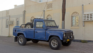 Land Rover Defender LWB Pick-up Oman Muscat Drive-by Snapshot by Sebastian Motsch front