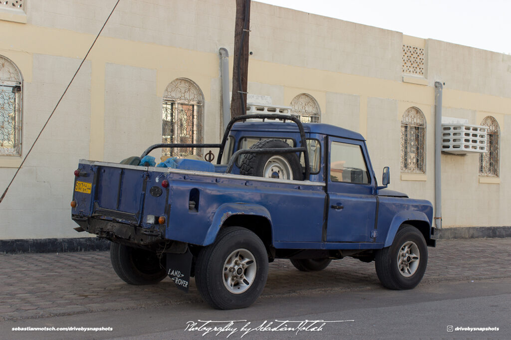 Land Rover Defender LWB Pick-up Oman Muscat Drive-by Snapshot by Sebastian Motsch rear