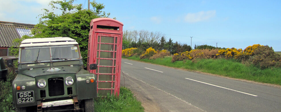 Land Rover Series II SWB Scotland with Red Telephone Booth Drive-by Snapshot by Sebastian Motsch