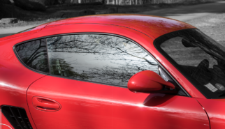 Porsche Cayman Reflections Drive-by Snapshot by Sebastian Motsch