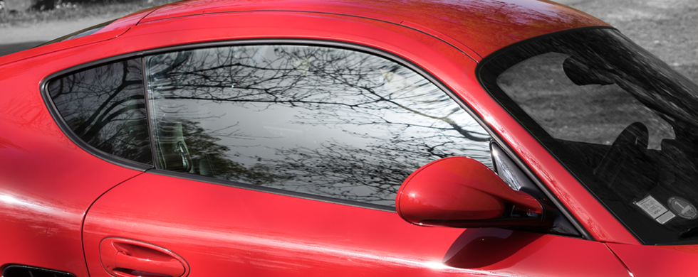 Porsche Cayman Reflections Drive-by Snapshot by Sebastian Motsch