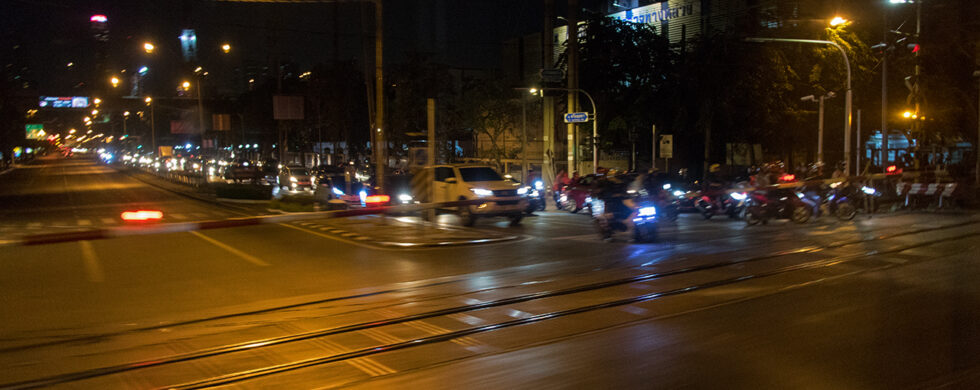 Bangkok Railroad Crossing at Night Photo by Sebastian Motsch