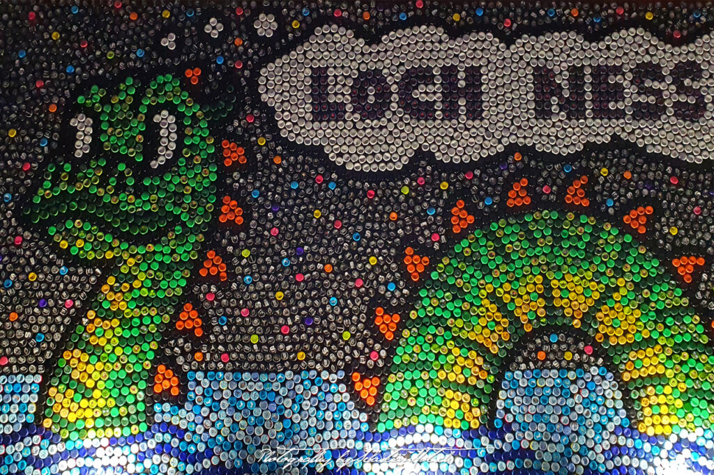 Bottle Cap Mural Street Art in Calvi Corsica Photo by Sebastian Motsch