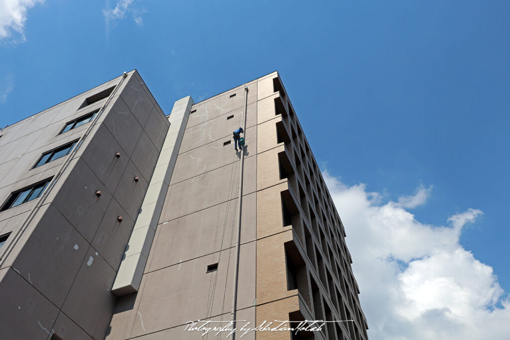 High Rise Building Worker in Roppongi Tokyo Japan by Sebastian Motsch