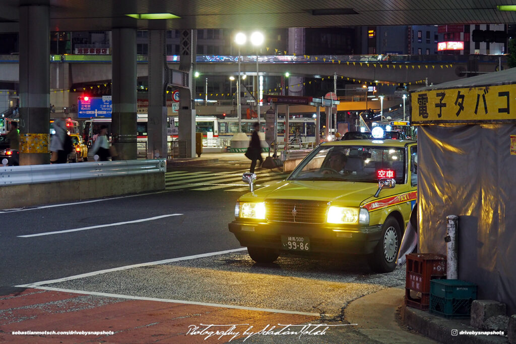 Toyota Crown Taxi in Shibuya Crossing Tokyo Japan Drive-by Snapshots by Sebastian Motsch