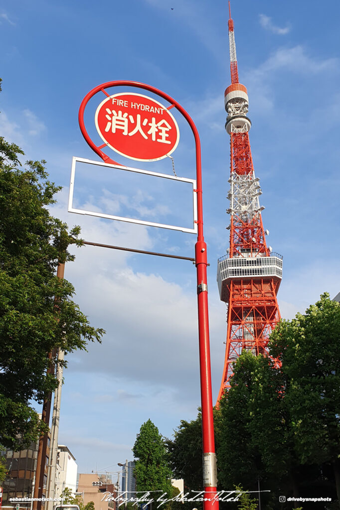 Fire Hydrant Sign near Tokyo Tower Photo by Sebastian Motsch