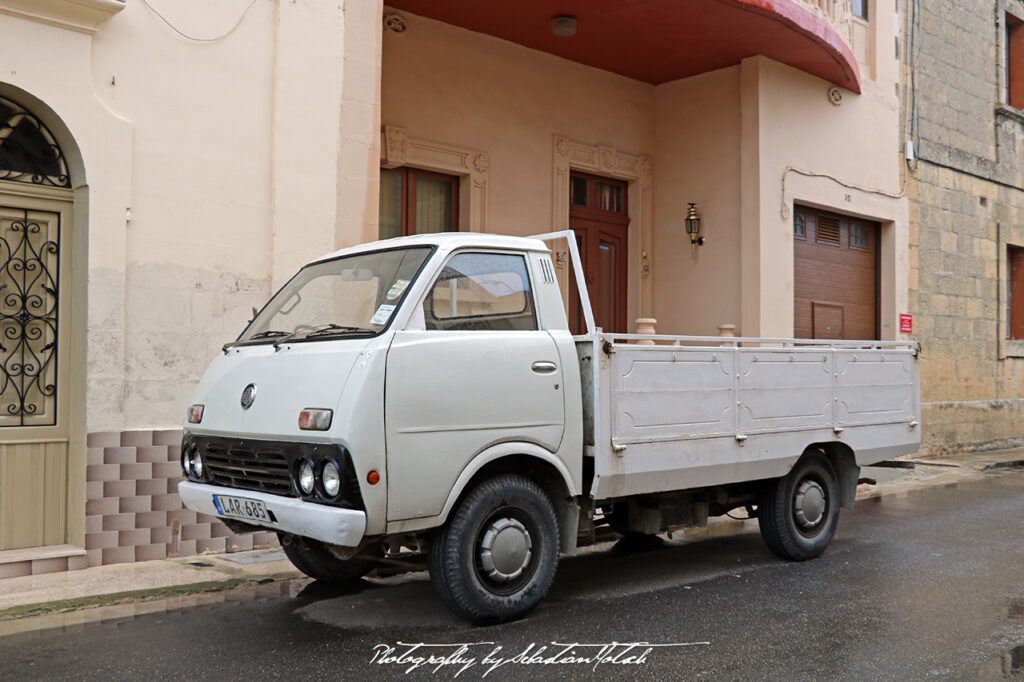 Nissan Flatbed Van with Dog Malta Drive-by Snapshots by Sebastian Motsch