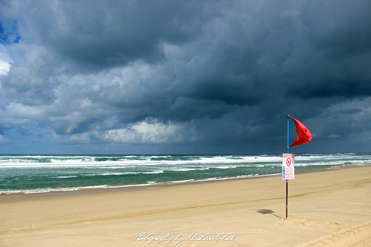 2015-09-17 Cap Homy Beach Flag Morning after Storm Photo by Sebastian Motsch